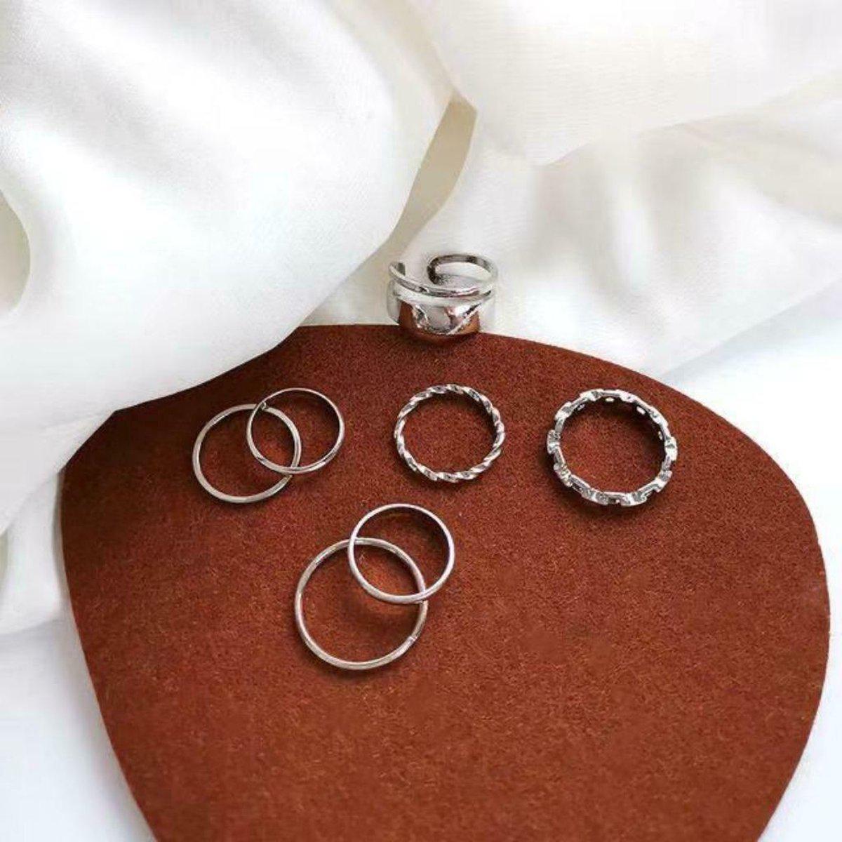 Set van 7 koperen verzilverde ringen